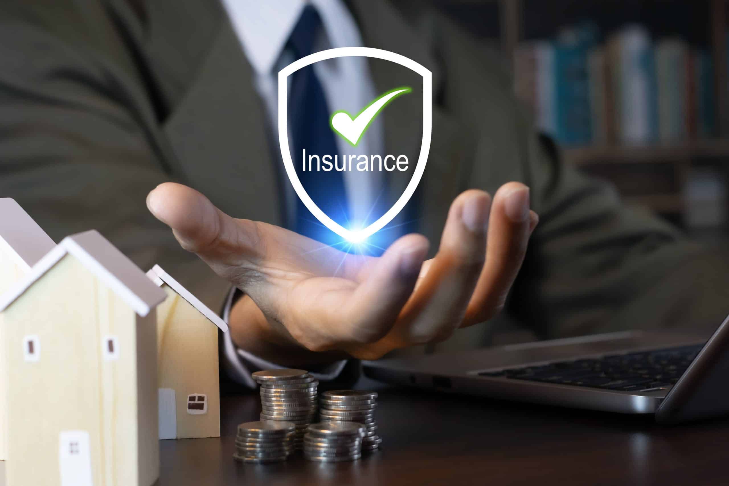 Insurance shield icon representing home and asset protection services.